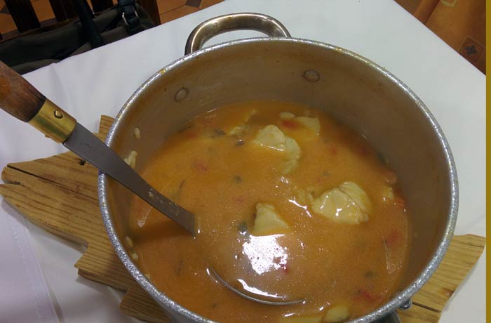 Cazuela de arroz con repe y langostinos de Os Melinhos Restaurantes en Espinho